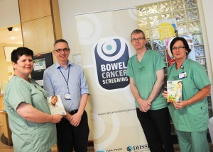 Dr William Dickey romoting free bowel cancer screening with Maria McGowan, Endoscopy sister and Specialist Screening Practitioner; Dr Graham Morrison, Consultant Gastroenterologist; Marian Purser, Endoscopy sister and Specialist Screening Practitioner.