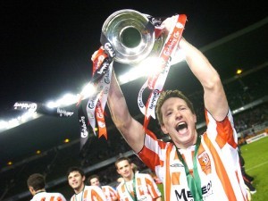 Barry Molloy celebrates lifting the FAI Cup with Derry City in 2006.