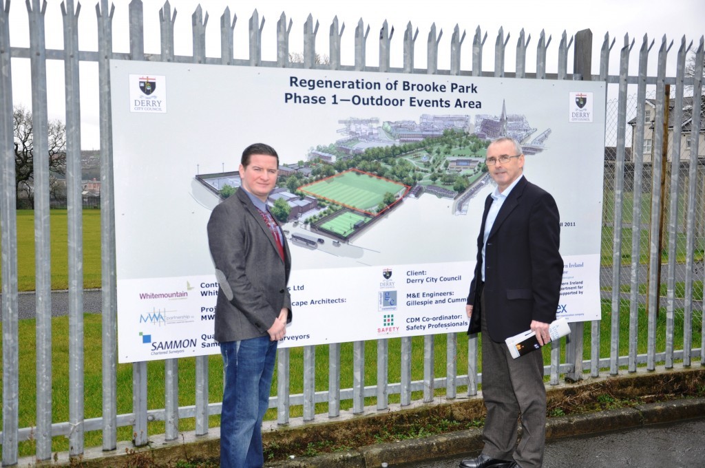 Councillor Barney O'Hagan (right) and Councillor Colly Kelly looking over the regeneration plans for Brooke Park
