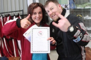 Ceilidh back on terra firma with her skydive tandem instructor Rod McCrory.