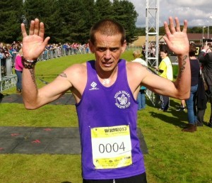 Foyle Valley AC's Keith Shiels celebrates winning last year's Waterside Half Marathon.