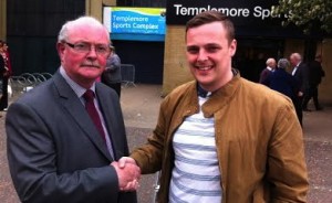 Sean Carr is congratulated on his election to the new Derry-Strabane "super council" by his son Jimmy.