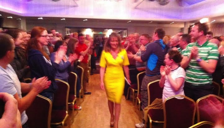 Sinn Fein European election candidate Martina Anderson receiving a standing ovation on her arrival in the Waterfoot Hotel in Derry last night.