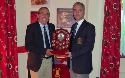 Maurice Quigg (left) is presented with the Past Captains/Presidents Trophy by Michael McCullough, the immediate past captain at City of Derry Golf Club.