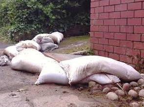 Sandbags failed to prevent flood water flowing into Holy Family Church.