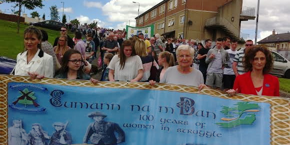 Sinn Fein MEPs Martina Anderson (extreme left) and Lynn Boylan (extreme right) taking part in the parade to Derry City Cemetery.