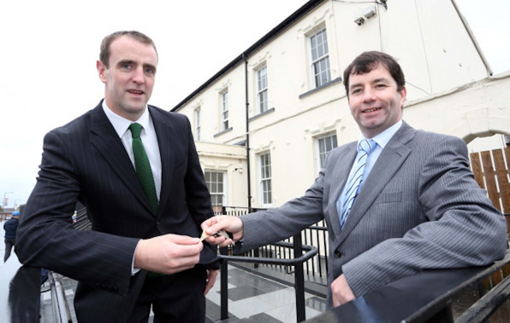Environment Minister Mark H Durkan (left) receiving the keys of the DOE's new HQ at Ebrington from Mel Higgins, Ilex chief executive. Photo: Lorcan Doherty Photography.