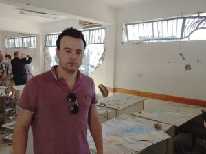 SDLP MLA Colum Eastwood surveys the damage caused to a school by an Israeli air strike during his visit to Gaza.