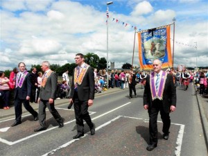 Beragh Orange Lodge parading along Castlegore Road in Castlederg last July.