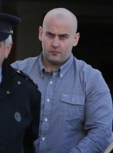 Mark Cassidy being led from Letterkenny Court to begin his three year prison sentence.