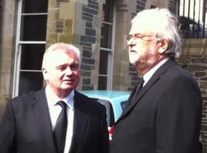 Eamon Holmes (left) and Ivan Little were among the mourners.