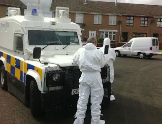 Police forensic officers at Ederowen Park where the van was hijacked.