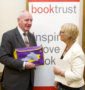 Foyle SDLP MP Mark Durkan supporting the "Reading Together Changes Lives" campaign with Viv Bird, chief executive of "book trust."