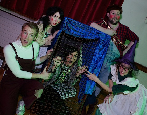  Hansel & Gretel attempts to save Mayor Brenda Stevenson as she is locked in the cage by the wicked witch