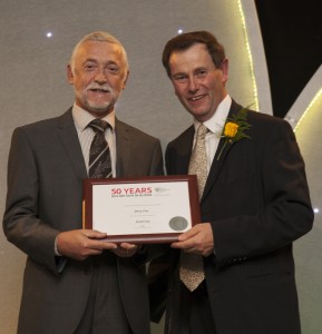 Danny McCartney (left), Derry City Council’s Grounds Maintenance, Parks and Cemeteries Manager picking up the Silver Gilt Award at the Britain in Bloom finals.