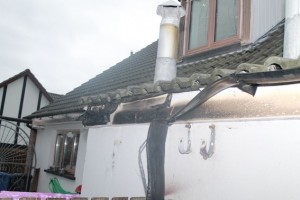 The damaged roof of the McFeely home.