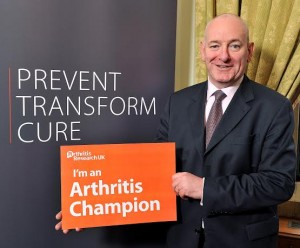 Foyle MP Mark Durkan supporting Arthritis Research's new manifesto and pledging to become an "Arthritis Champion."
