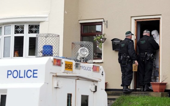 PSNI officers at the home of Derry Syrian rebel suspect, Eamon Bradley, following his arrest.Photo Lorcan Doherty Photography