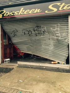 The damaged shop front in Rosskeen Park after it was rammed by stolen car