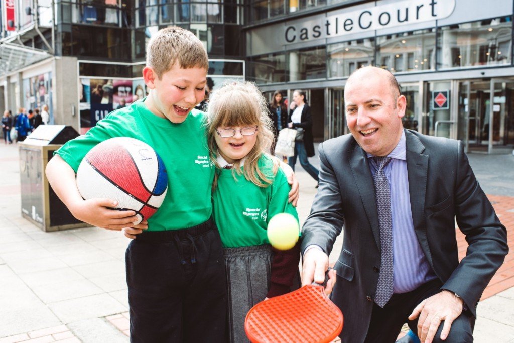 Special Olympics athletes Sam Mullan and Carys Rowe, Newtownabbey Racers with Paul McMhon, Castlecourt, Sponsor for Special Olympics Ulster, are calling upon the public to support the charity’s annual Collection Day this Friday April 24.  
