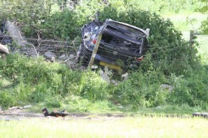 The mangled wreckage of the Volkswagen Golf which smashed outside Derry this morning claiming the lives of two men. 