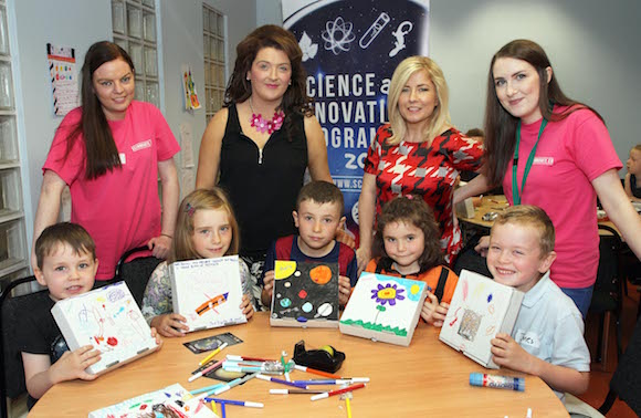 Local children pictured attending a Science & Innovation  ‘Space Camp’, programme in the Tower Museum, organised by the legacy department at Derry City and Strabane District Council. Included standing (from left) are facilitator Claire Brolly, Legacy department staff Sheree Brolly and Elsa Edwards and facilitator Erin O’Donnelly. 3015-9466MT.