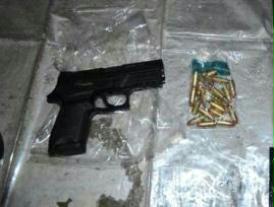 The Sig Sauer pistol and ammo haul found by police in Derry graveyard