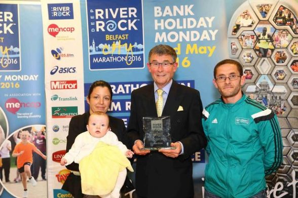 Louise James receiving her award for running a leg of the Belfast Marathon in May this year